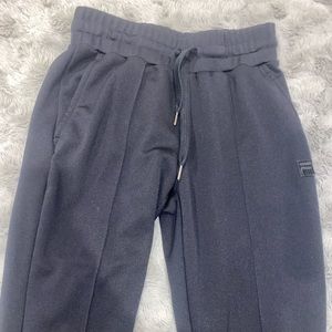 Bandier black joggers with zipper flare bottom